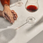 Couple holding hands on a Caesarstone Solenna kitchen worktop