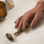 Lady's Hand on a Caesarstone Solenna worktop